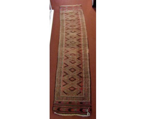 Two eastern runners, with eight diamond motif medallions, flatwoven ends, 273 x 63cm and another similar runner, 259 x 62cm. 