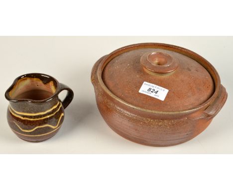 A Leach Pottery stoneware cooking pot with lid, together with a small jug.