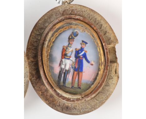 A late 19th century enamelled miniature showing a dragoon and another officer in a landscape, 2.7 x 2cm, in a vulcanite locke