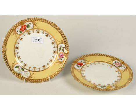 A pair of Chamberlains Worcester dessert plates, each with gadrooned border and pale yellow ground rim with three gilt framed