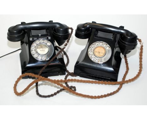 A black telephone handset with number drawer, model 332FTl48/2, Call Exchange button, together with one other black telephone