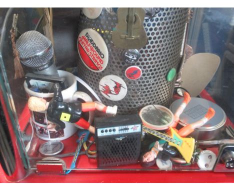 Fossil Classic former display stand filled with badges, and memorabilia inc. The Jam badge , UK Subs lighter, etc., H180cm