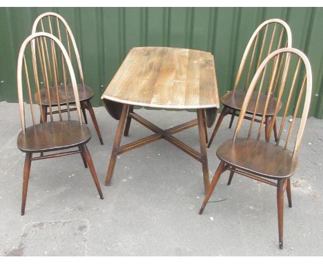 Ercol oval drop leaf dining table, on square supports with an X stretcher, 112cm x 123cm max and a set of four Ercol Quaker d