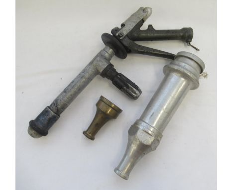 Vintage nozzle from firefighter hose with various attachments