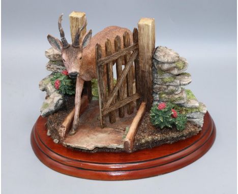 Border Fine Arts figure group 'Unwelcome Guest', modelled as a deer with garden gate, H16cm, antlers A/F