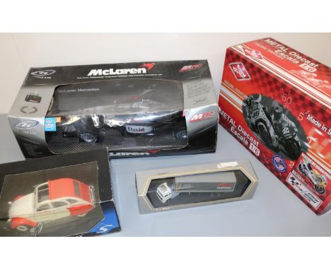 Collection of die-cast model vehicles, incl. 1:10 scale Mclaren Mercedes MP4-16, Corgi Bosch Platinum model truck, etc. (4)