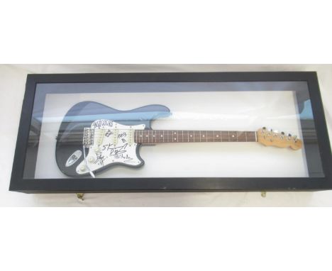 Buzzcocks - Cased Farida electric guitar signed by 4 members of the Buzzcocks : Pete Shelley, Steve Diggle, Tony Barber & Dan