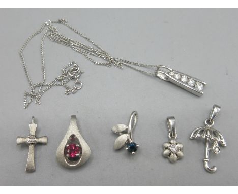 9ct white gold necklace set with clear stones on 9ct gold chain, 1.6g, and a collection of 14ct white gold pendants of variou
