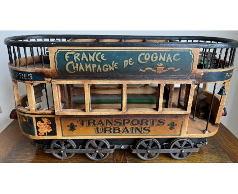 Painted wood and metal decorative model of a French tram, inscribed ‘Transports Urbains’, L66cm