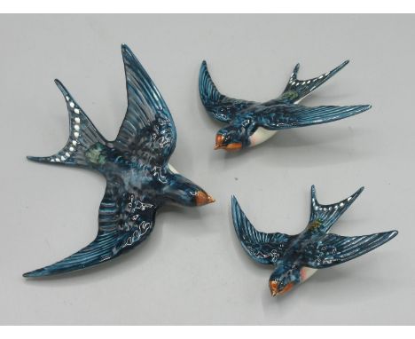 Three Beswick Swallow wall plaques, model no. 757, largest L16cm