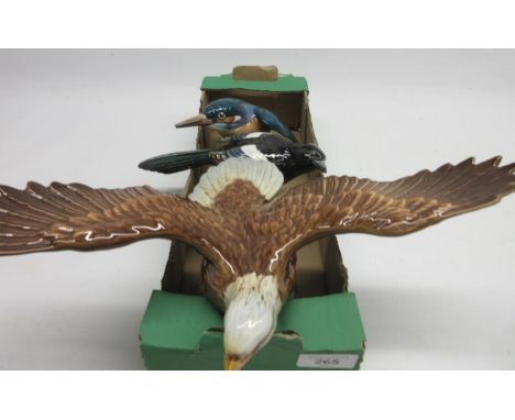 Three Beswick Birds: Eagle model no. 1018, Kingfisher model no. 2371 A/F, and Magpie model no. 2305 A/F, max. H17cm