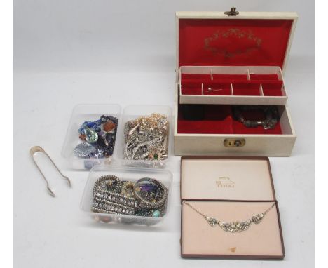 Large collection of costume jewellery to include brooches, earrings, necklaces, glass, gem and crystal pendants, and a jewell