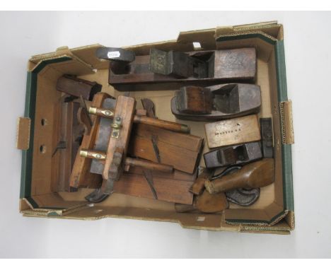 Early 20th Century adjustable rebating plane, L30.5cm; four similar period moulding planes and other period woodworking tools