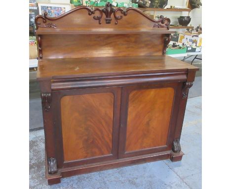 Victorian mahogany Chiffonier, single shelved back with scroll cresting, above two panel doors on skirted base, W130cm D56cm 