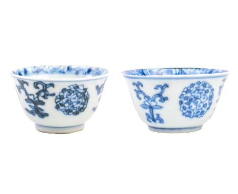 Two similar Chinese blue and white porcelain tea bowls, Kangxi period. Height 3.5cm, diameter 6.5cm. (2)