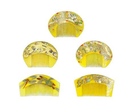 Five Japanese celluloid combs, circa 1920's-1930's. With decoration varying from birds, dragonflies and foliage, in gold, ena