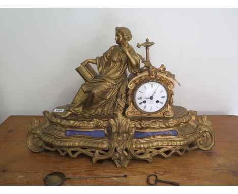 A gilt spelter figural French striking mantle clock with pendulum and key, the case stamped A Jerome, has been repainted, the