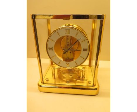 A Jaeger-le-Coultre Atmos gilt brass mantle clock, 23cm tall x 20cm x 15cm, no 679398, good condition, working order, with bo