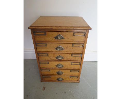 An oak 6 drawer collectors cabinet, 46cm tall x 32cm x 24cm, with a good light oak colour 