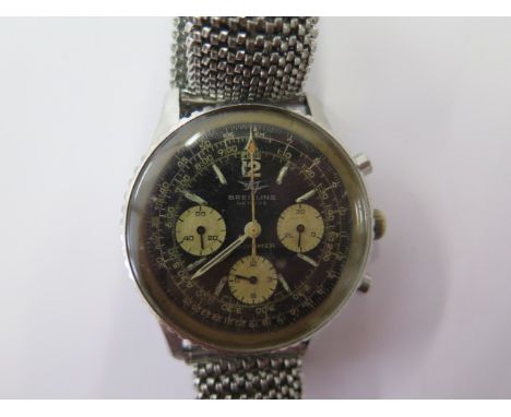 A vintage Breitling Navitmer stainless steel chronograph wristwatch ref 806 with black dial and 3 white subsidiary dials, 40m