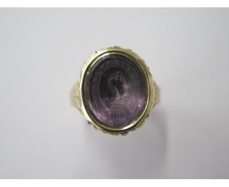 A Georgian / Victorian (9ct gold tested) amethyst intaglio seal ring, reshanked, size S, approx 10 grams, head 18mm x 15mm, i