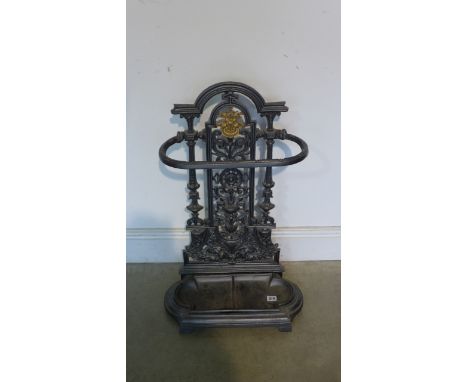 A Victorian style cast iron stick stand with drip tray, approx 72cm H, in good condition 