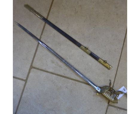 A 20th century Naval Officers sword British, with shagreen grip, blade 80cm long - generally good, minor pitting to grip, sli