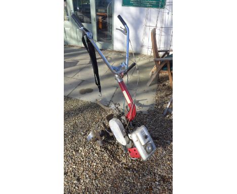 A Honda G28 engine F28c rotovator rototiller, may need a service 