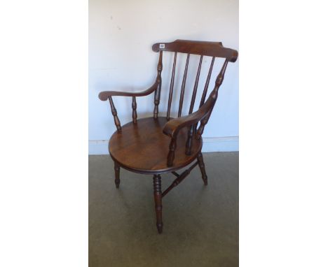 A Victorian penny seat stick back mahogany Windsor armchair - in good condition 