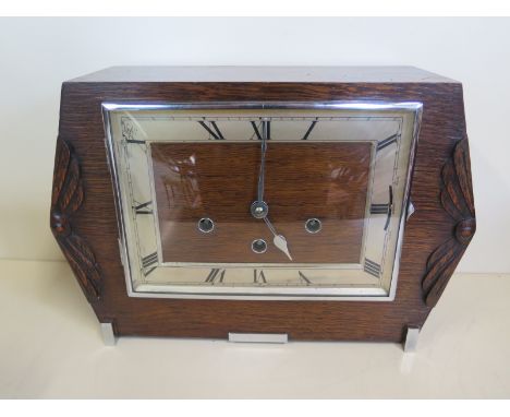 A 1920s Deco oak case mantle clock, 8 day movement with Westminster, and Whittington Chimes 