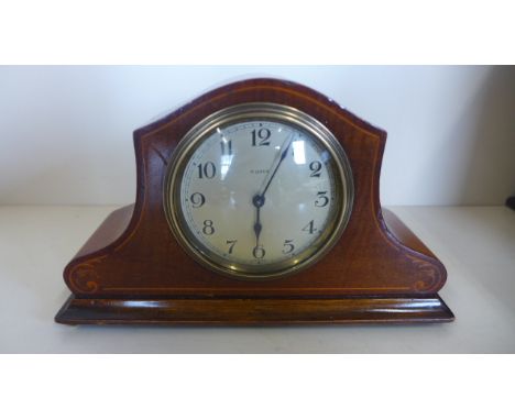 A Edwardian inlaid case 8 day mantle clock - in working condition 