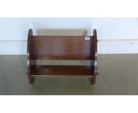 An attractive 1920s mahogany book trough of pegged construction, 37cm H x 54cm W - in polished condition 