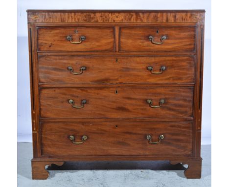 A Victorian mahogany chest of two short over three long drawers with cock beading and metal ring handles, satinwwod inlay wit