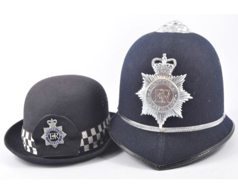 A Cromwell Police Beat Duty helmet, size 7⅛,another similar, both Lincolnshire Constabulary, and a Metropolitan Policewomans 