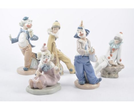 Five Nao porcelain clown models.