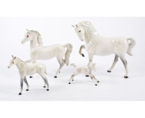 Beswick horse figures; no.815 grey gloss horse, no.1813 grey gloss foal, no.1549 grey horse first version, no.1261 grey horse