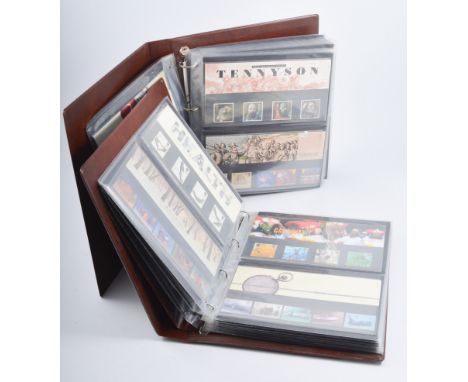  Stamps - Three albums of collectors packs, containing mint stamps as issued 1982-1999, a themed album of Benham silk first d