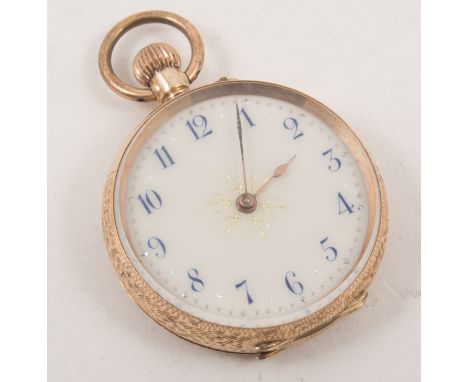 An open face pocket watch, cream enamel dial with arabic numerals in a yellow metal case with foliate engraved decoration aro