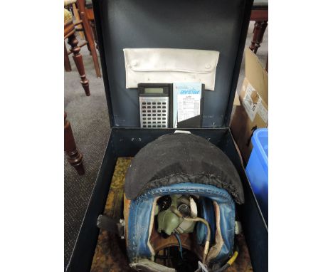 A mid 20th century MK3 pilots helmet, in carry case, with a Jeppesen Sanderson Avstar pilots flight computer