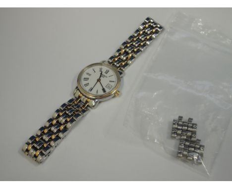 A ladies wrist watch by Tissot having a Roman numeral dial with second hand and date aperture, with a linked strap, no: 12395