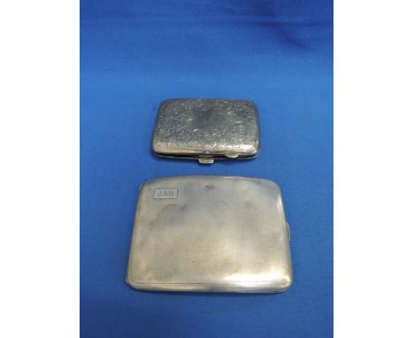 An Edwardian silver cigarette case having scroll engraved decoration and plain cartouche, Birmingham 1903,  Joseph Gloster, a