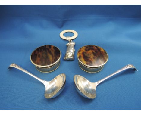 A pair of plated trinket boxes of circular form having blue silk linings and tortoise shell style lids, a plated baby's teeth