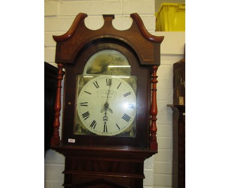 An early 19th century mahogany and oak longcase clock having swan neck pillar hood containing painted dial and 30 hour moveme