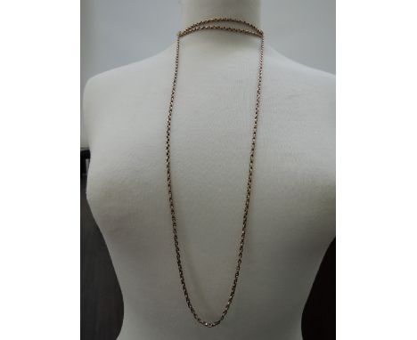 A yellow metal muff chain stamped 9ct, approx 38g and 80'