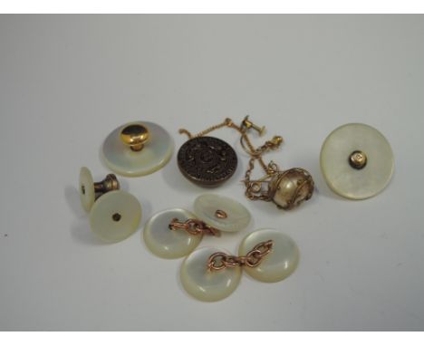 A small quantity of yellow metal jewellery including mother of pearl cufflinks, collar studs, safety chain, earring etc