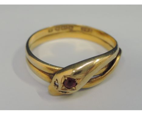 An 18ct gold snake ring having having diamond and ruby decoration, Chester 1901