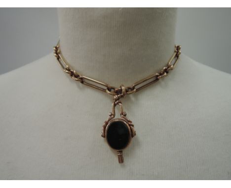 A 9ct rose gold watch chain with agate fob,  approx 53.3g