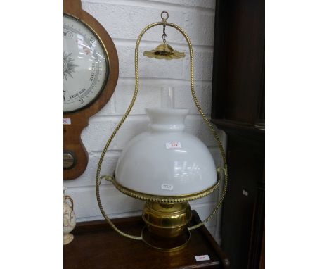 A 20th century brass oil lamp of ship design