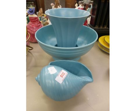 A Wedgwood, Keith Murray design vase, planter in a conche shell on turquoise ground