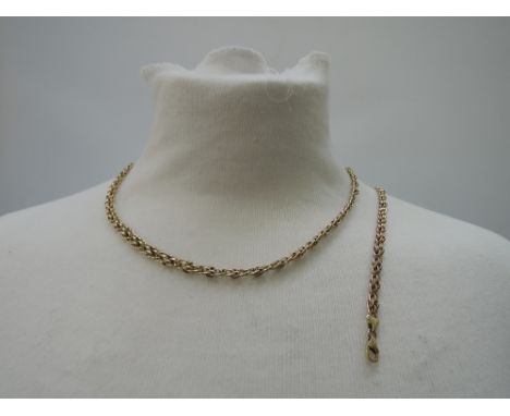 A fancy link 9ct gold chain with matching bracelet